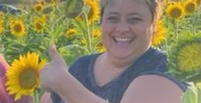 Woman In Sunflowers Image